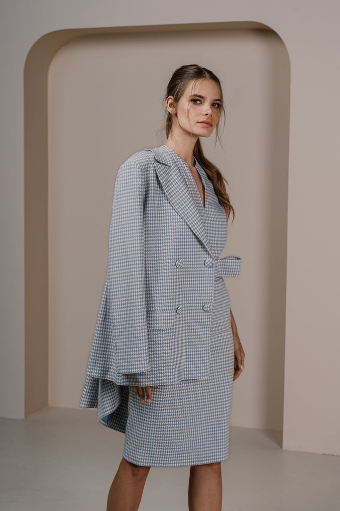Side profile of pastel blue houndstooth sheath dress – sleeveless with blazer 