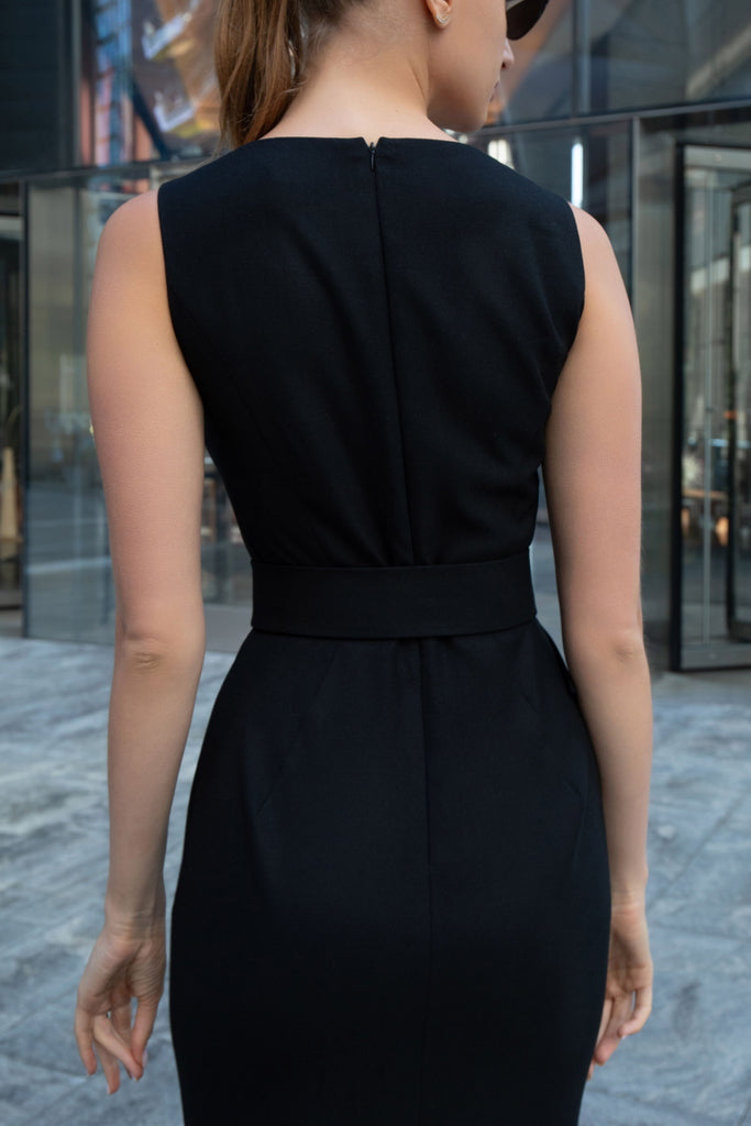 Side view of tailored black maxi dress by Anastasiia Ivanova, minimalist silhouette
